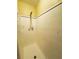 Bathroom with white tile shower and modern fixtures, ensuring a clean and functional space at 5801 Poinciana Ave, Lakeland, FL 33809