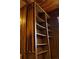 Beautiful game room features a built-in bookcase and billiard cue rack, perfect for entertaining guests at 5801 Poinciana Ave, Lakeland, FL 33809