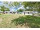 Expansive backyard featuring the house and the shed providing lots of room for outdoor activities at 760 Formosa Ave, Bartow, FL 33830