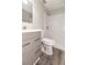 Well-lit bathroom showcasing a new vanity, toilet, and shower with modern finishes and neutral tones at 760 Formosa Ave, Bartow, FL 33830