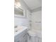 Bathroom featuring a tub-shower combo, modern vanity, and neutral fixtures, with a clean and timeless design at 760 Formosa Ave, Bartow, FL 33830