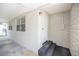 Welcoming front porch with brick wall, steps, and a white door at 760 Formosa Ave, Bartow, FL 33830