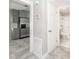 Hallway with an entryway view into the kitchen and bathroom at 760 Formosa Ave, Bartow, FL 33830