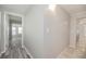 Hallway with an entryway view into the sunroom and kitchen at 760 Formosa Ave, Bartow, FL 33830