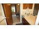 Bathroom with a vanity, a single sink and a view into an adjacent bedroom area at 925 Fenton Ln # 11, Lakeland, FL 33809