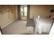 Bedroom featuring a bed, bench, and a view through the window at 925 Fenton Ln # 11, Lakeland, FL 33809
