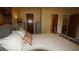 Cozy bedroom with a bed, grey furniture, and a painting on the wall above the bed at 925 Fenton Ln # 11, Lakeland, FL 33809