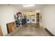 Spacious garage featuring a washer, dryer, storage shelves and plenty of room for parking at 925 Fenton Ln # 11, Lakeland, FL 33809