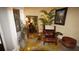 Comfortable living room with leather chair and warm natural lighting at 925 Fenton Ln # 11, Lakeland, FL 33809