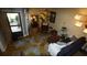 Cozy living room featuring unique stained concrete floors, comfortable seating, and modern lighting at 925 Fenton Ln # 11, Lakeland, FL 33809