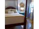 Beautiful main bedroom with an elegant bed, tasteful decor, and great natural light at 925 Fenton Ln # 11, Lakeland, FL 33809