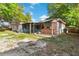 Backyard with patio and lush green surroundings at 1586 Fergason Ave, Deltona, FL 32725