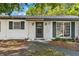 Close up of the front entrance to a one-story home at 1586 Fergason Ave, Deltona, FL 32725