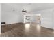 Open living room with wood-look floors at 1586 Fergason Ave, Deltona, FL 32725