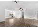 Open floor plan living room with a partial view into another room at 1586 Fergason Ave, Deltona, FL 32725