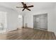 Spacious main bedroom with laminate floors, closet, and ensuite bathroom at 1586 Fergason Ave, Deltona, FL 32725