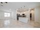 Open-concept kitchen with stainless steel appliances, granite countertops, and a central island at 421 Arkansas Ct, Poinciana, FL 34759