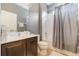 This bathroom features a shower/tub combo and a large vanity at 3221 Dark Sky Dr, Harmony, FL 34773