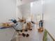 Bright foyer with tile flooring, staircase, and lots of natural light at 3221 Dark Sky Dr, Harmony, FL 34773
