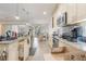 Well-lit kitchen with granite countertops and stainless steel appliances at 3221 Dark Sky Dr, Harmony, FL 34773