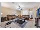 Spacious living room with carpet flooring and a ceiling fan at 3221 Dark Sky Dr, Harmony, FL 34773