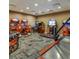 This community game room has a variety of arcade style games including racing and pinball machines at 8882 Geneve Ct, Kissimmee, FL 34747