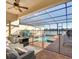 Relaxing screened pool area boasts brick pool deck, blue tiled pool, outdoor seating and dining area at 8882 Geneve Ct, Kissimmee, FL 34747