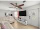 Cozy living room showcasing comfortable seating and a modern entertainment setup at 1143 Ne 23Rd St, Ocala, FL 34470
