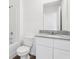 Bright bathroom featuring a shower/tub combo and a granite countertop at 2222 Oklahoma Dr, Sumterville, FL 33585