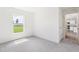 Bright bedroom with carpet and natural light at 2222 Oklahoma Dr, Sumterville, FL 33585