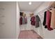 Spacious walk-in closet with ample shelving and hanging space for organized storage at 2383 Oklahoma Dr, Sumterville, FL 33585