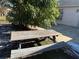 Backyard with picnic table and mango tree at 1152 Mccormick Dr, Deltona, FL 32725