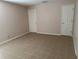 This is a spacious bedroom features white trim, tile flooring, and two convenient closets at 1152 Mccormick Dr, Deltona, FL 32725