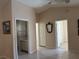 Spacious bedroom with tiled floor, featuring access to bathroom and closet at 1152 Mccormick Dr, Deltona, FL 32725