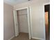 Bedroom with empty closet and tile flooring at 1152 Mccormick Dr, Deltona, FL 32725