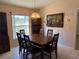 Elegant dining area with stylish lighting and furniture at 1152 Mccormick Dr, Deltona, FL 32725