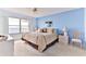 Relaxing ocean view bedroom with king-size bed and light blue walls at 1183 Ocean Shore Blvd # 5050, Ormond Beach, FL 32176