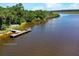 Tomoka State Park, featuring a wooden dock and bench at 109 La Toscana Rotonda, Ormond Beach, FL 32174