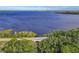 Aerial view of bridge over calm waterway at 109 La Toscana Rotonda, Ormond Beach, FL 32174