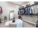 Large walk-in closet with ample shelving and hanging space at 109 La Toscana Rotonda, Ormond Beach, FL 32174