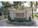 Toscana community entrance sign with landscaping and palm trees at 109 La Toscana Rotonda, Ormond Beach, FL 32174