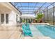 Enjoy this refreshing pool with a covered patio and comfortable seating at 109 La Toscana Rotonda, Ormond Beach, FL 32174