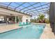 Inviting pool and patio with covered lanai and seating at 109 La Toscana Rotonda, Ormond Beach, FL 32174