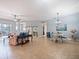 Bright dining area with tile flooring and a chandelier at 112 Sevilla Ct, Poinciana, FL 34759