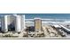 Residential condo buildings with parking and ocean views from street level at 2071 S Atlantic Ave # 201, Daytona Beach Shores, FL 32118