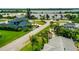 Aerial view of neighborhood with waterfront property and lush landscaping at 45 San Jose Dr, Ormond Beach, FL 32176