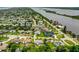 Aerial showcasing waterfront home and neighborhood at 45 San Jose Dr, Ormond Beach, FL 32176