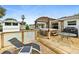 Spacious deck with hot tub, pergola, and lounge chairs at 45 San Jose Dr, Ormond Beach, FL 32176