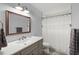 Updated bathroom with gray vanity and shower at 45 San Jose Dr, Ormond Beach, FL 32176