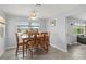 Dining area with a wooden table and chairs, near kitchen at 45 San Jose Dr, Ormond Beach, FL 32176